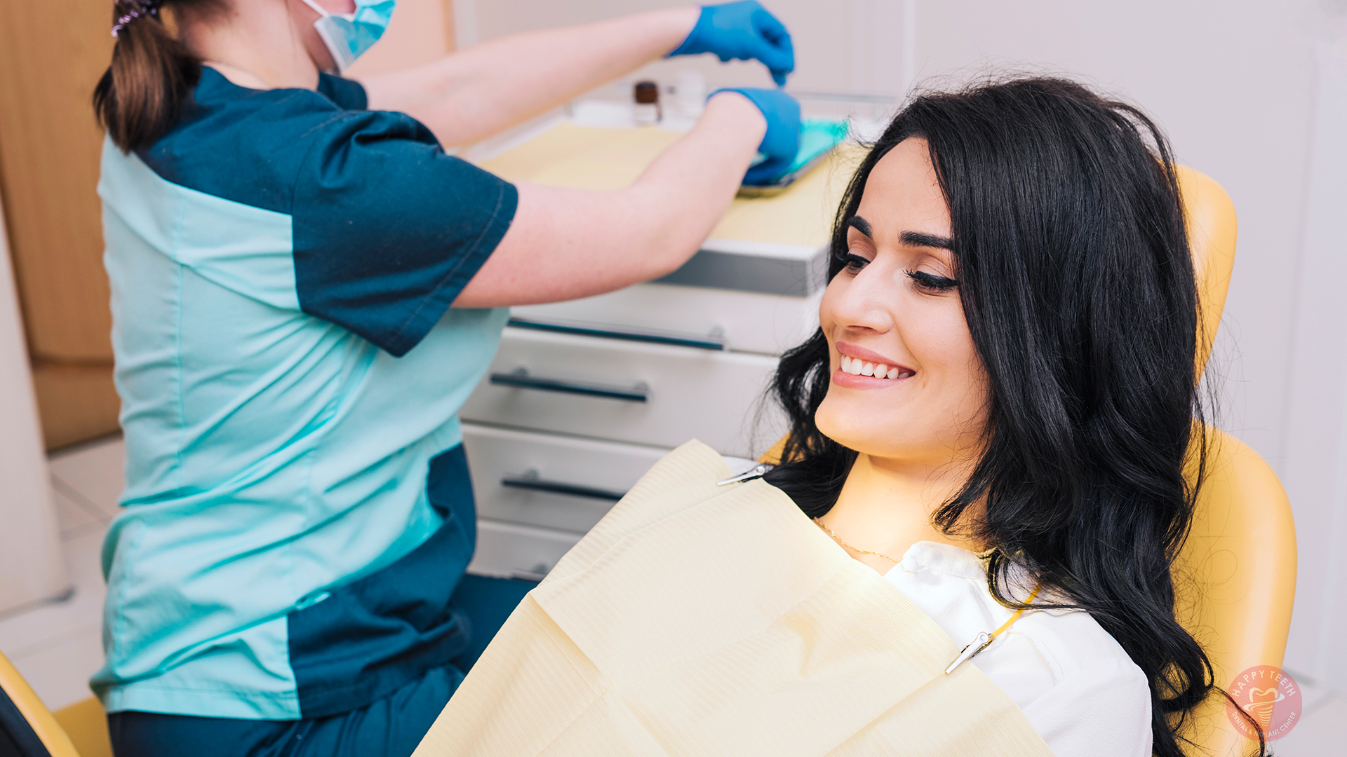 A happy patient showing a rejuvenated look after learning How Dentures Can Restore Your Smile at Happy Teeth Dental & Implant Centre.